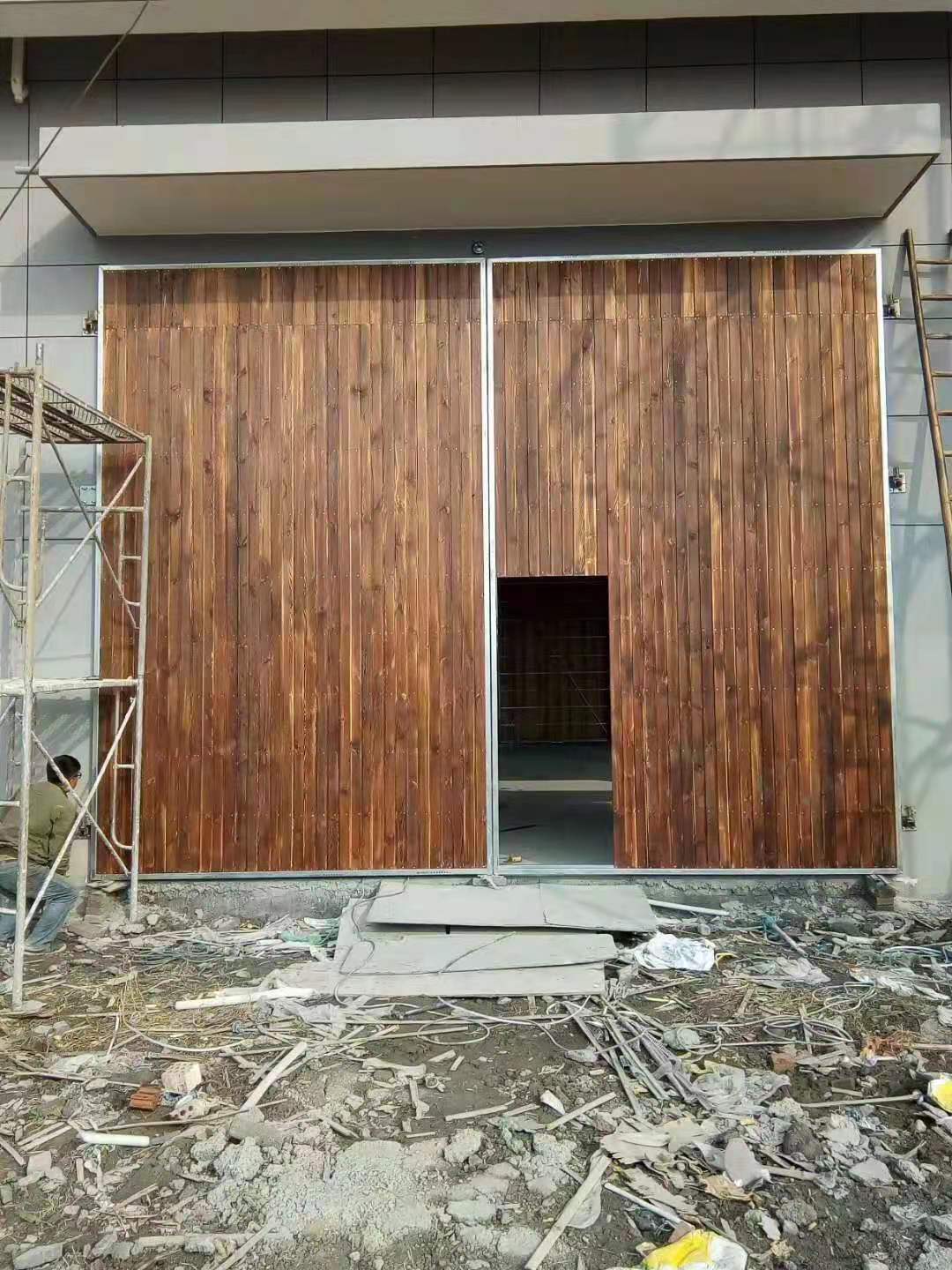 1650615399681029.jpg 钢木大门.jpg